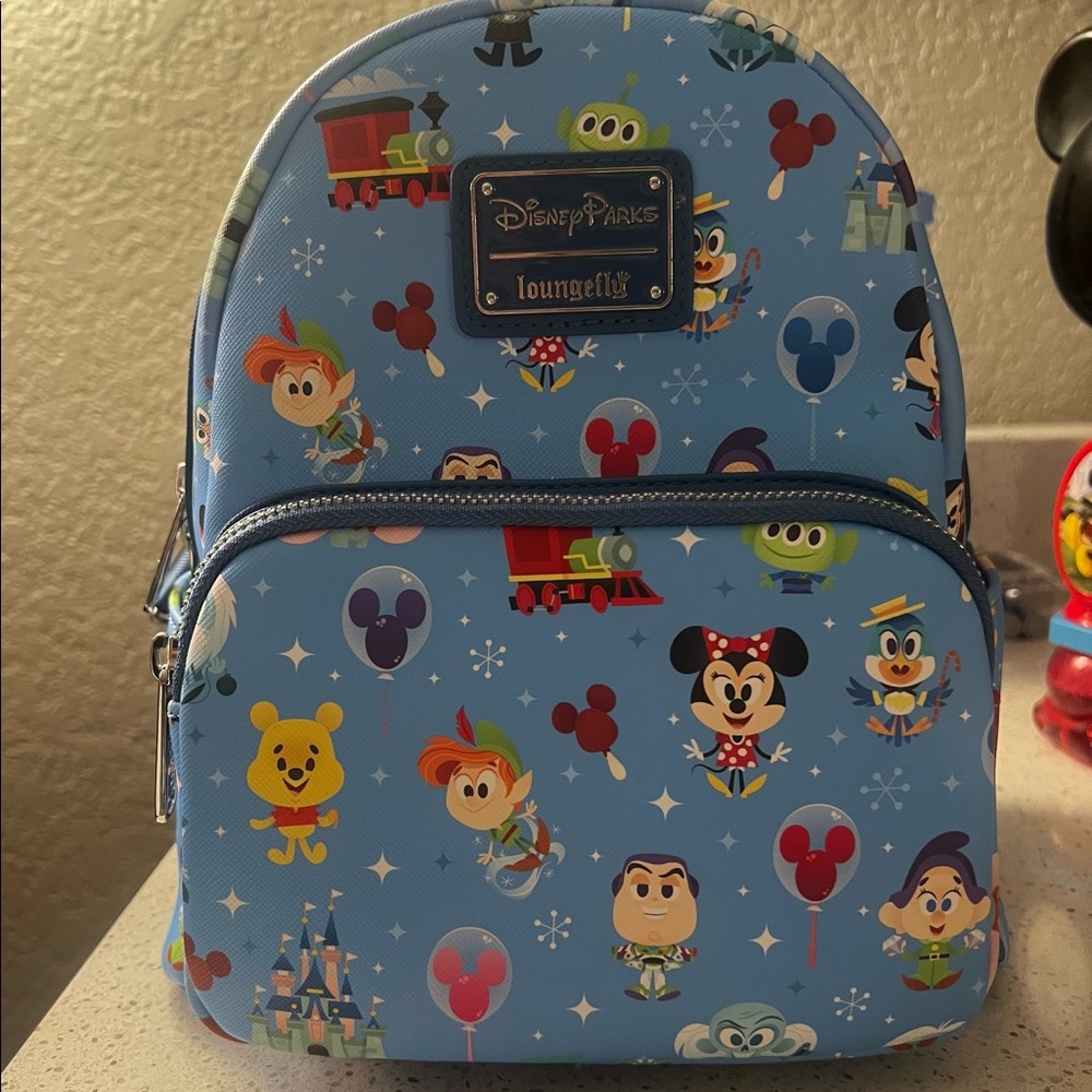 Walt Disney World Loungefly original backpack.  Character design.